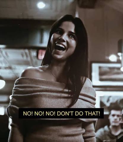 A woman laughing, captioned NO! NO! NO! DON'T DO THAT!